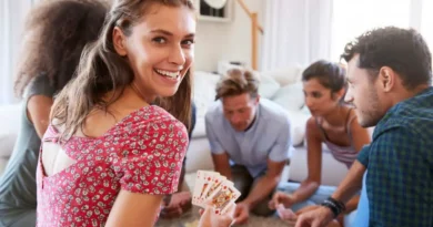 men and women play poker in a home setting