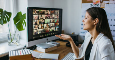 a woman is in a zoom meeting