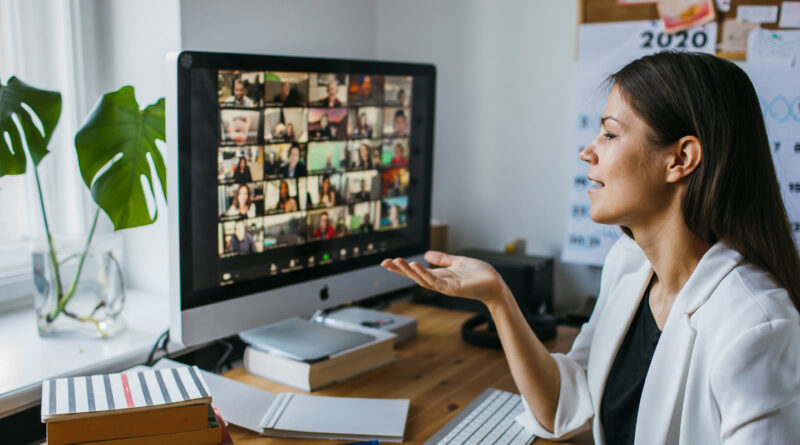 a woman is in a zoom meeting