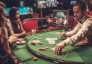 women playing poker in a casino with a croupier