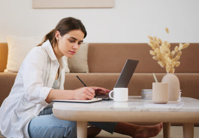 woman working on laptop at home