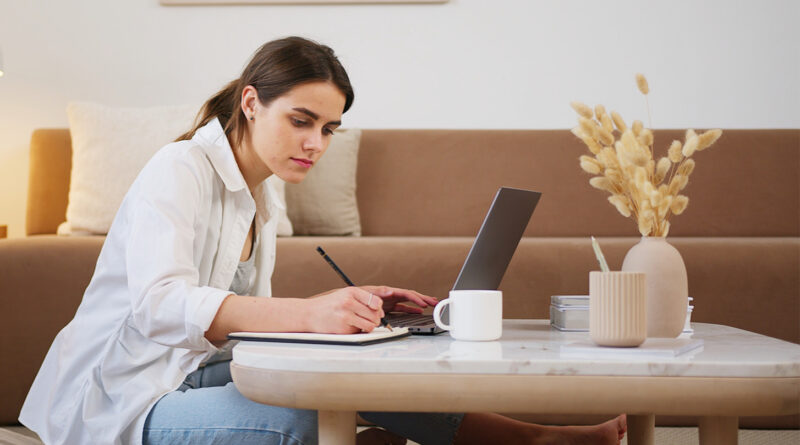 woman working on laptop at home