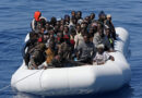 Migrants seen in boat after being rescued in Mediterranean Sea